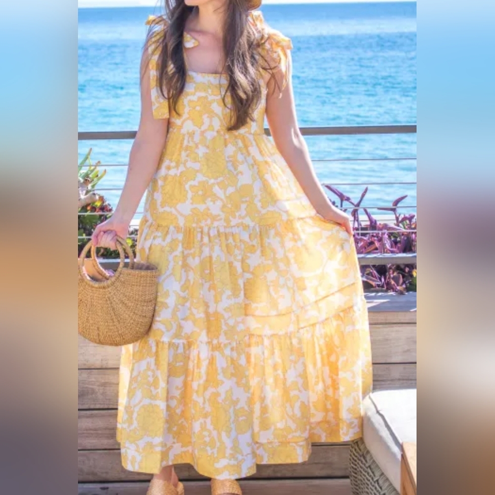 Yellow floral maxi dress with tie shoulders. size medium